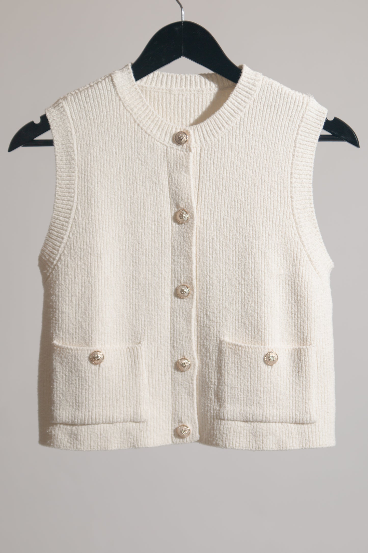 Knit waistcoat top with gold buttons