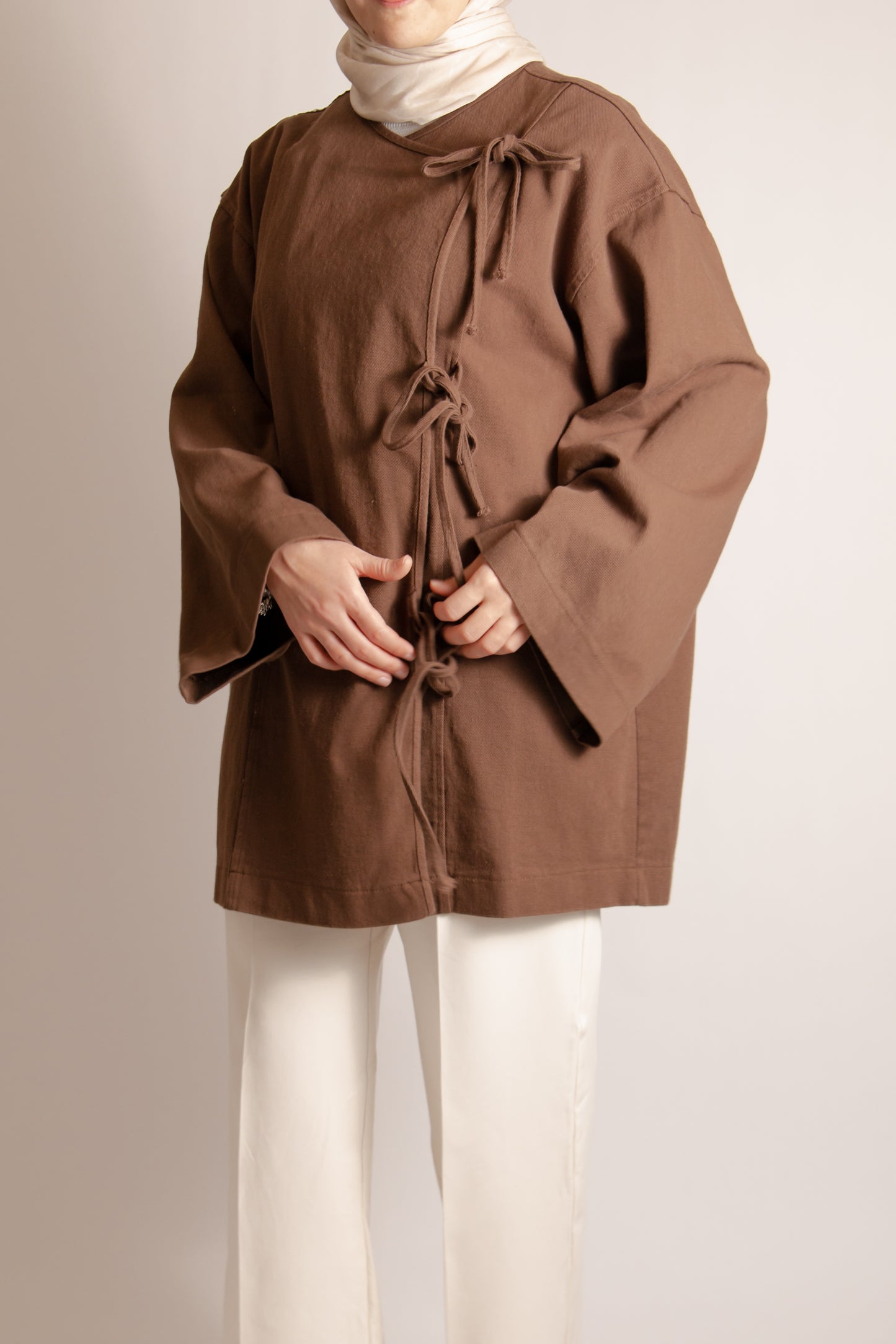 Cotton jacket with side ties