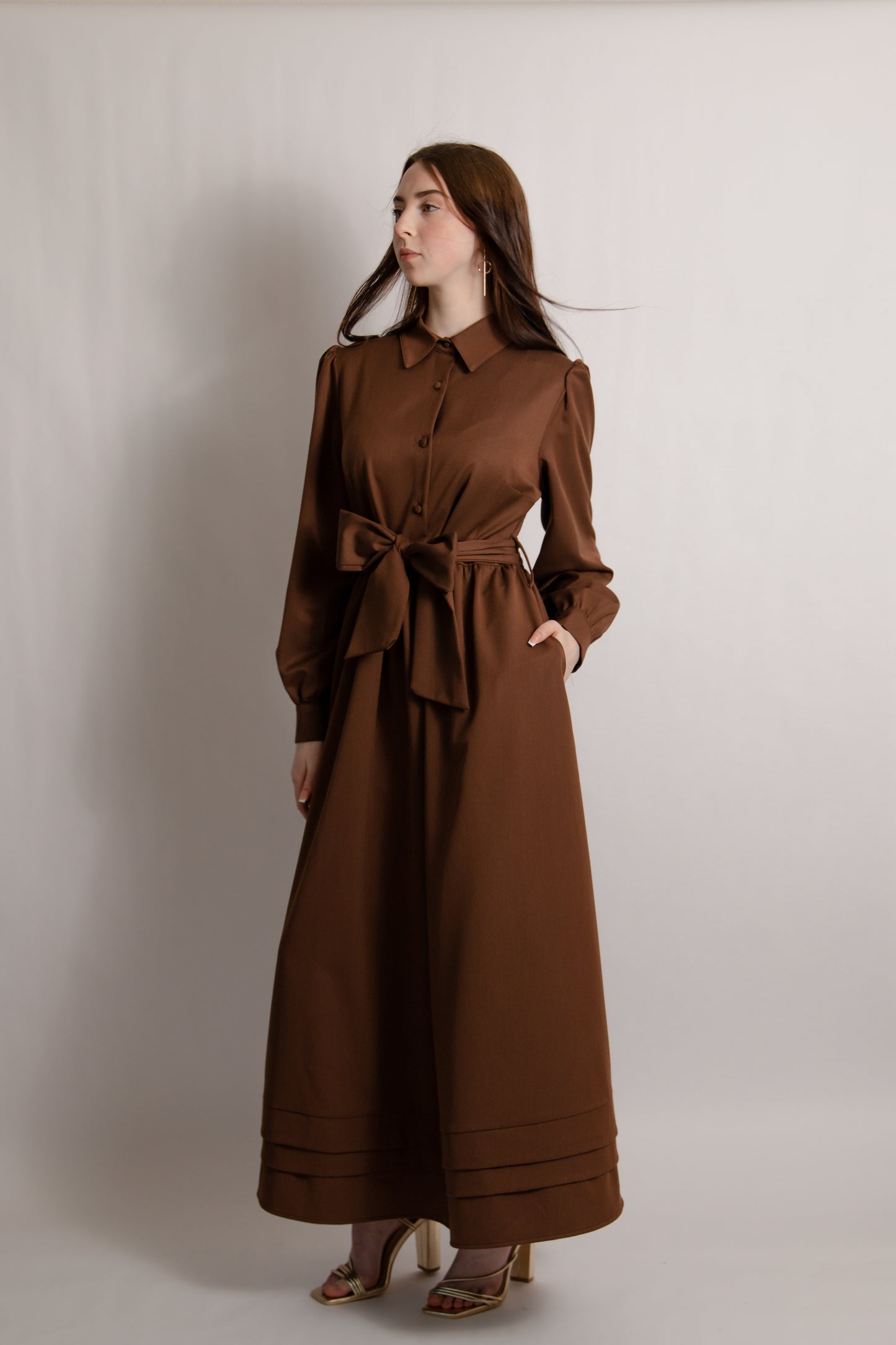Belted dress with pintuck hem