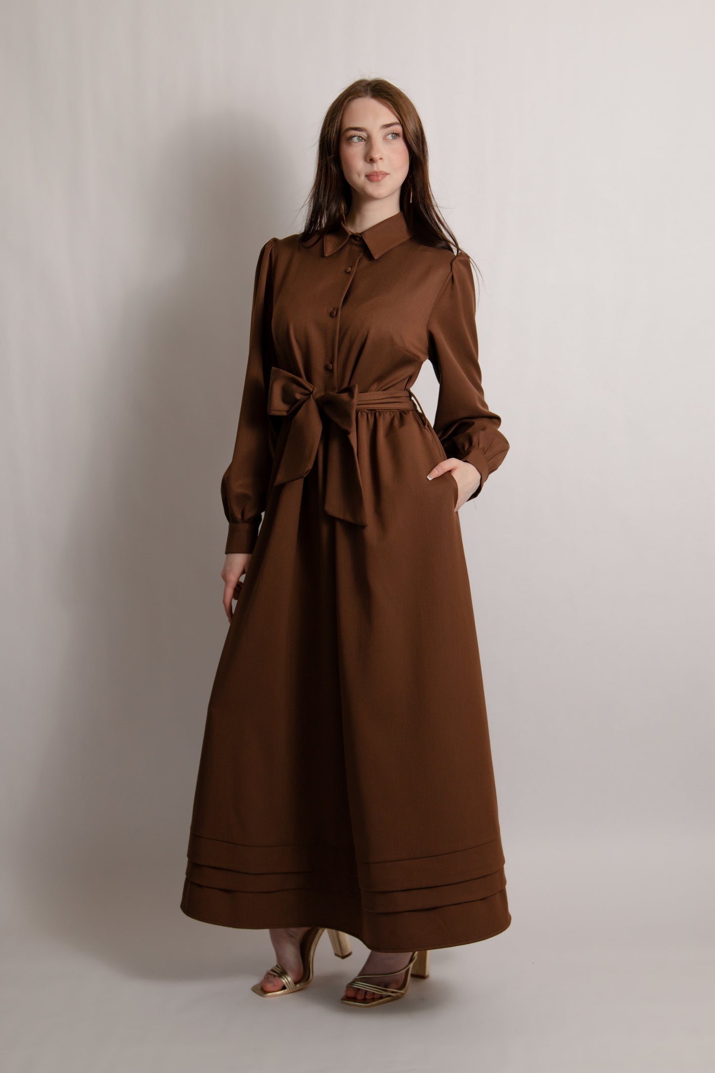 Belted dress with pintuck hem